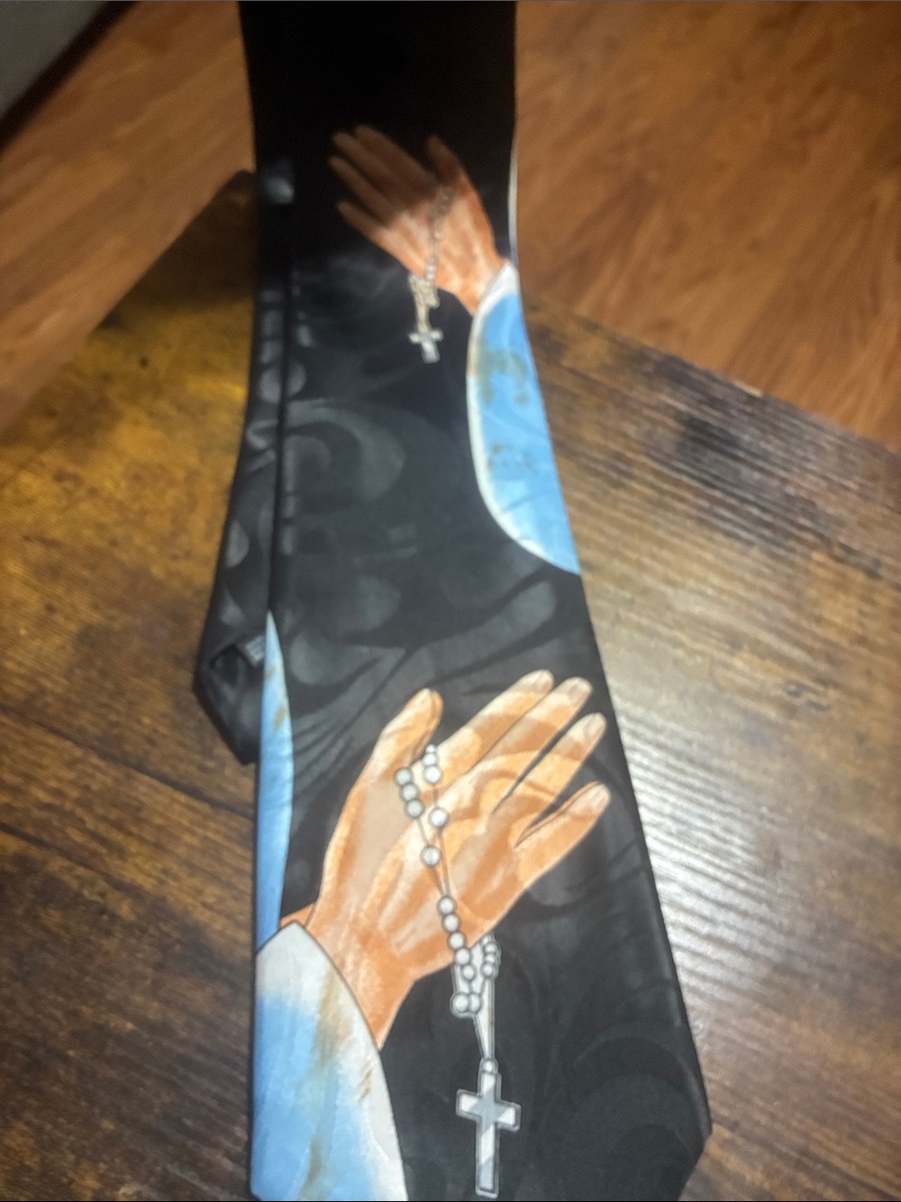 Men's Black Novelty Prayer Hands Tie with Blue Accents
